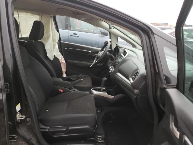 Photo 4 VIN: JHMGK5H51GX036429 - HONDA FIT LX 