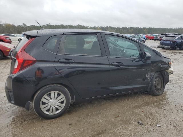 Photo 2 VIN: JHMGK5H51GX037984 - HONDA FIT LX 