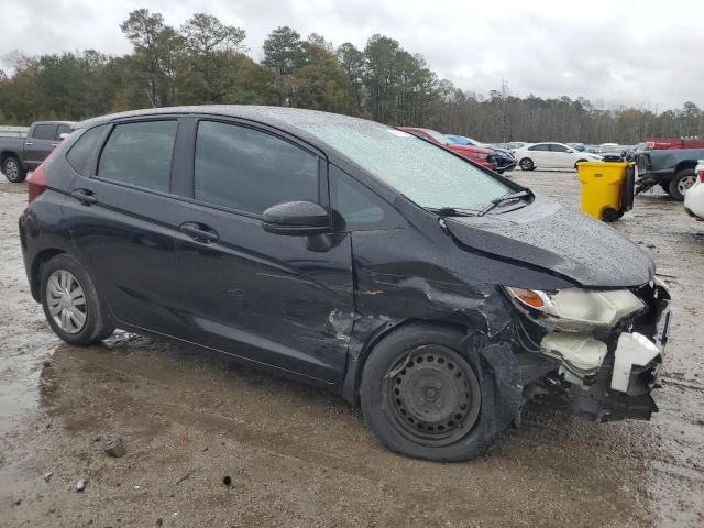 Photo 3 VIN: JHMGK5H51GX037984 - HONDA FIT LX 