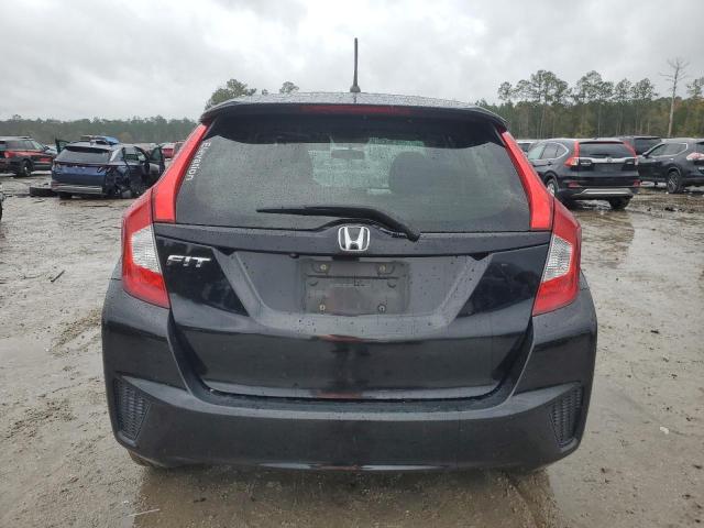 Photo 5 VIN: JHMGK5H51GX037984 - HONDA FIT LX 