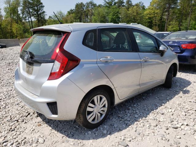 Photo 3 VIN: JHMGK5H51GX040237 - HONDA FIT LX 