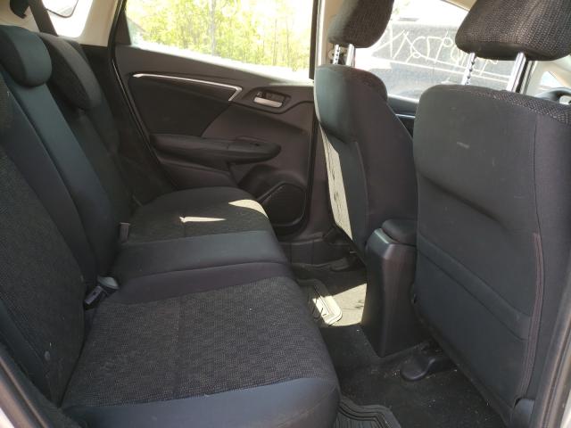 Photo 5 VIN: JHMGK5H51GX040237 - HONDA FIT LX 