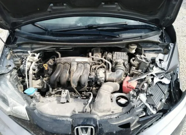 Photo 9 VIN: JHMGK5H51GX041159 - HONDA FIT 