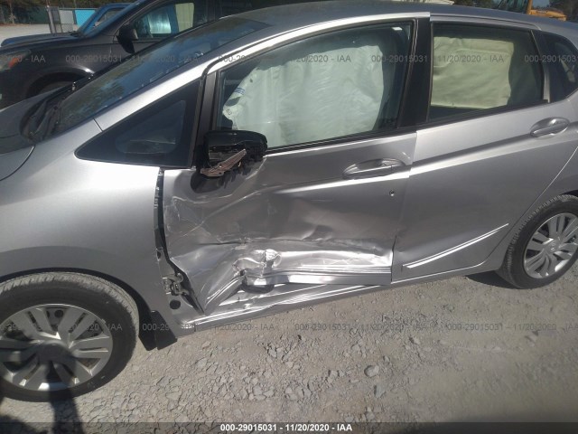 Photo 5 VIN: JHMGK5H52GS004585 - HONDA FIT LX 