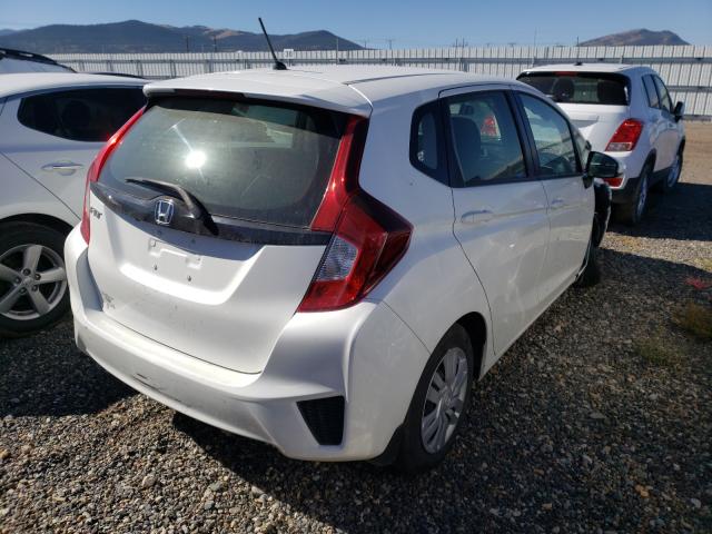 Photo 3 VIN: JHMGK5H52GX006646 - HONDA FIT LX 