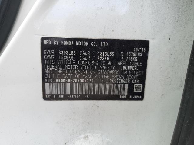 Photo 11 VIN: JHMGK5H52GX007179 - HONDA FIT LX 