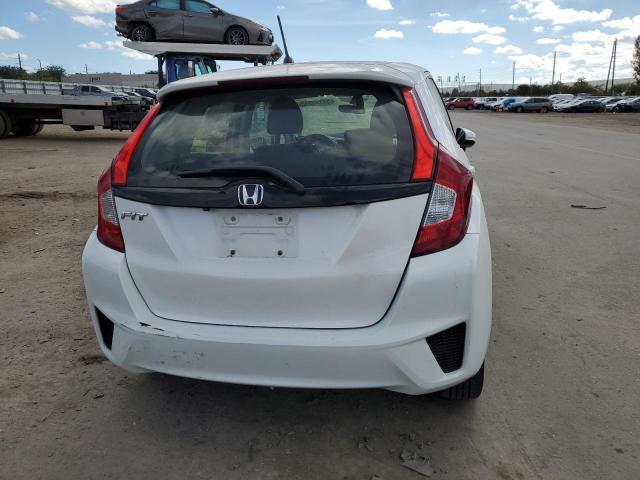 Photo 5 VIN: JHMGK5H52GX007179 - HONDA FIT LX 