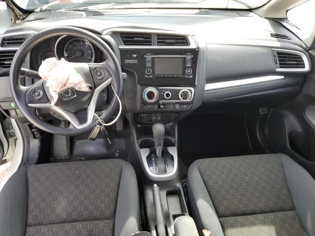 Photo 7 VIN: JHMGK5H52GX007179 - HONDA FIT LX 