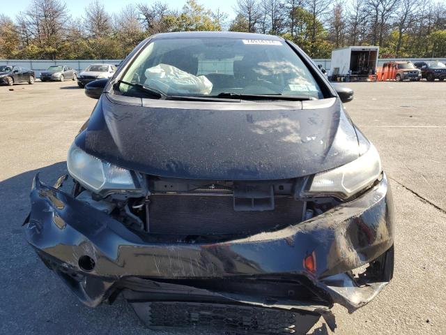 Photo 4 VIN: JHMGK5H52GX009319 - HONDA FIT LX 