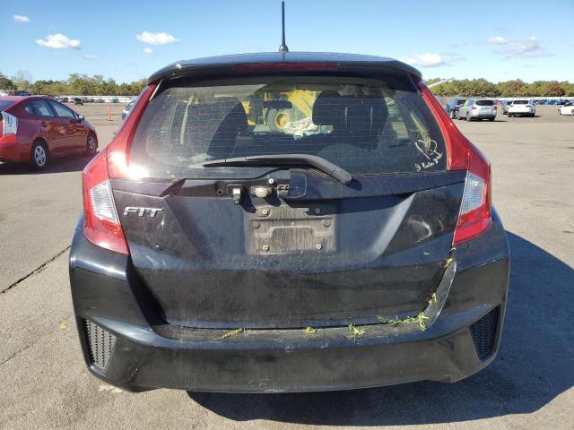 Photo 5 VIN: JHMGK5H52GX009319 - HONDA FIT LX 