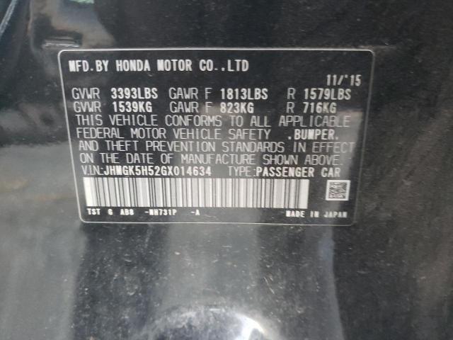 Photo 11 VIN: JHMGK5H52GX014634 - HONDA FIT LX 