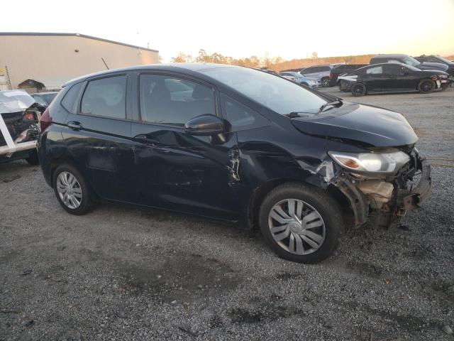 Photo 3 VIN: JHMGK5H52GX014634 - HONDA FIT LX 