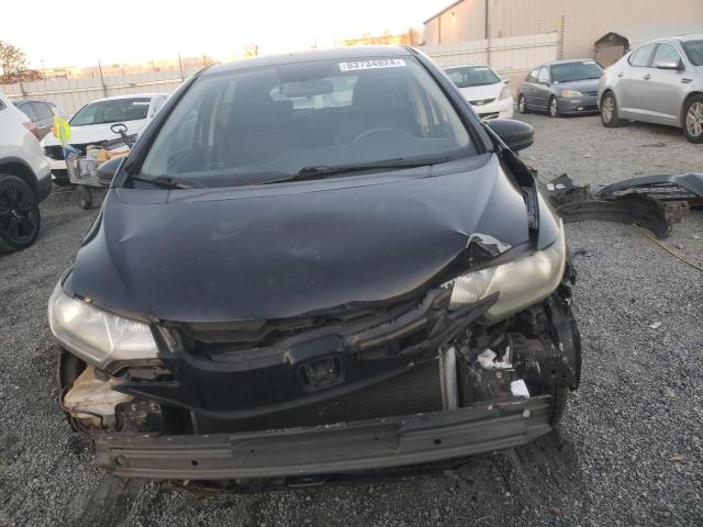 Photo 4 VIN: JHMGK5H52GX014634 - HONDA FIT LX 