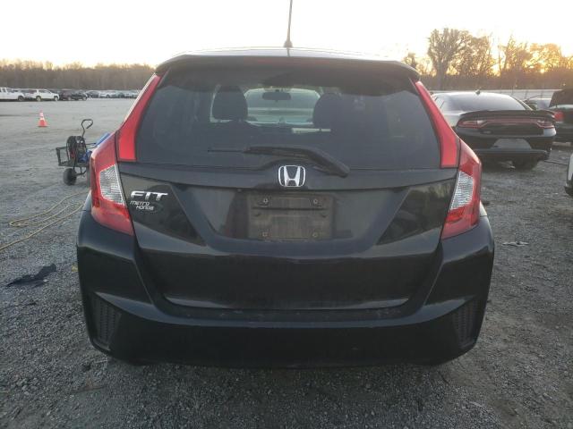 Photo 5 VIN: JHMGK5H52GX014634 - HONDA FIT LX 