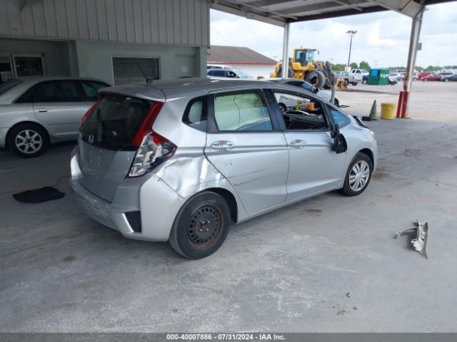 Photo 3 VIN: JHMGK5H52GX017291 - HONDA FIT 