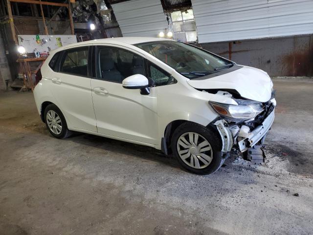 Photo 3 VIN: JHMGK5H52GX038951 - HONDA FIT LX 