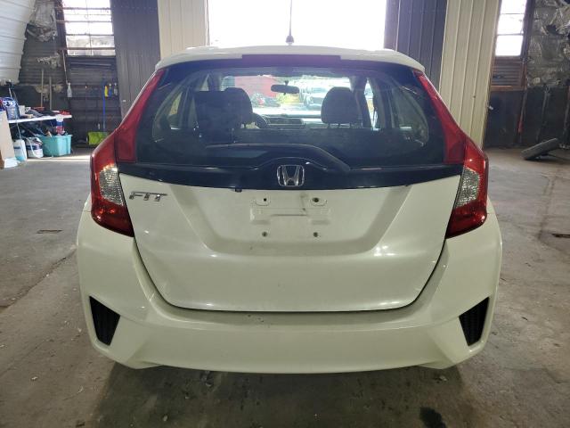 Photo 5 VIN: JHMGK5H52GX038951 - HONDA FIT LX 