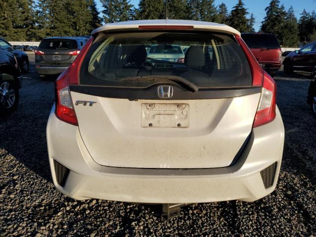 Photo 5 VIN: JHMGK5H53GS012582 - HONDA FIT LX 