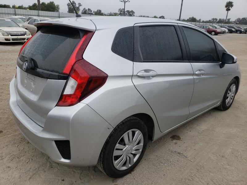 Photo 3 VIN: JHMGK5H53GX004596 - HONDA FIT LX 