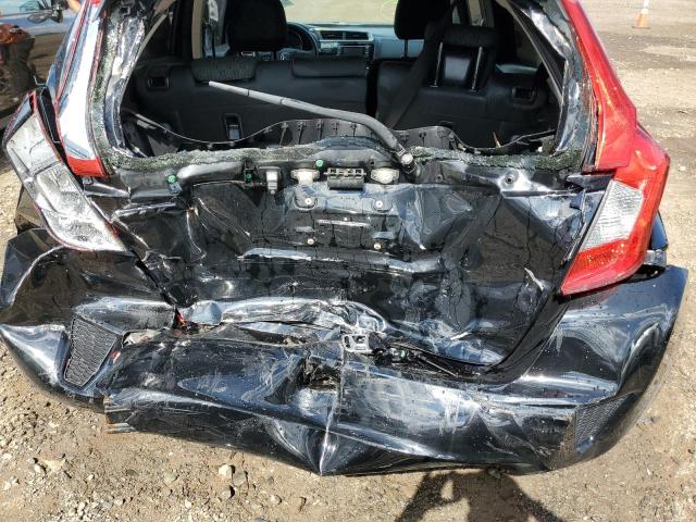 Photo 8 VIN: JHMGK5H53GX008888 - HONDA FIT LX 