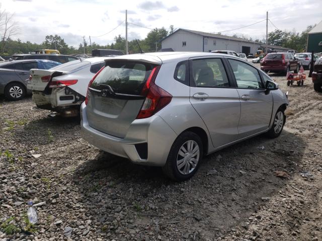 Photo 3 VIN: JHMGK5H53GX023696 - HONDA FIT LX 