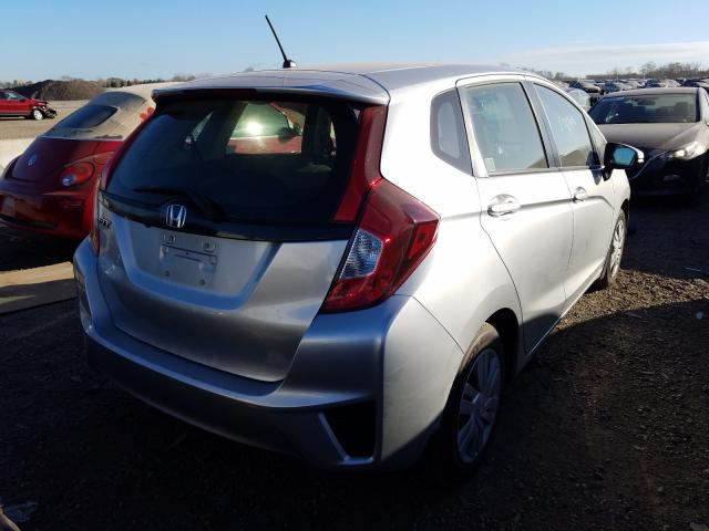 Photo 3 VIN: JHMGK5H53GX025206 - HONDA FIT LX 