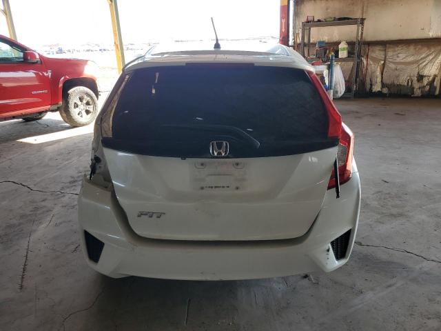 Photo 5 VIN: JHMGK5H53GX029661 - HONDA FIT LX 