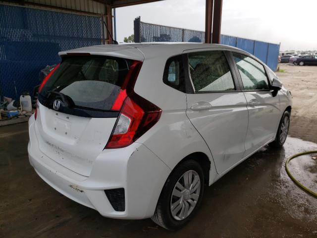 Photo 3 VIN: JHMGK5H54GS015328 - HONDA FIT LX 