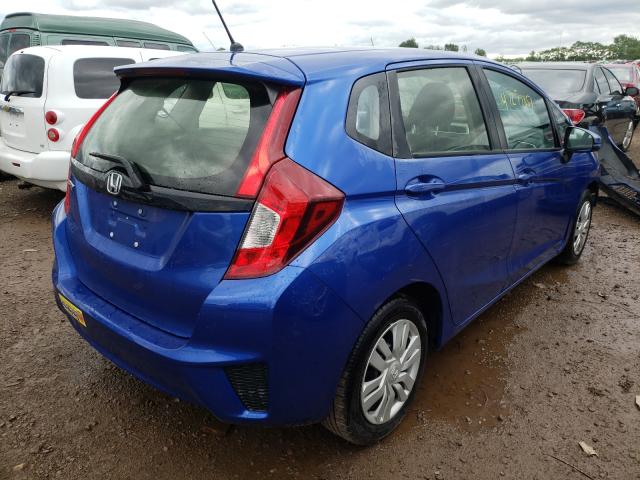 Photo 3 VIN: JHMGK5H54GX003909 - HONDA FIT LX 