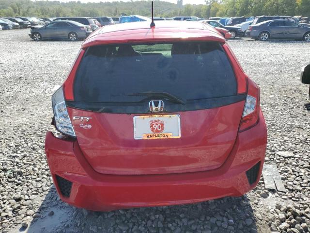 Photo 5 VIN: JHMGK5H54GX007572 - HONDA FIT LX 