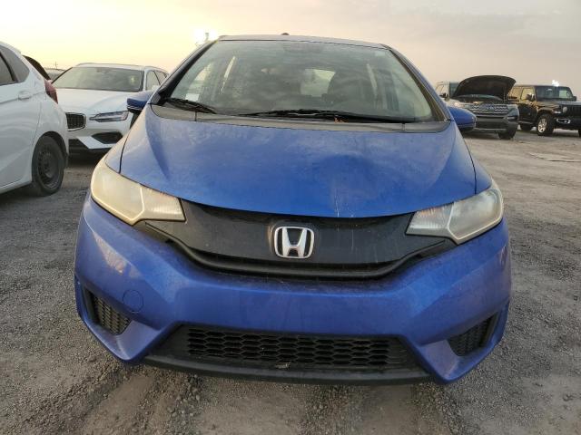 Photo 4 VIN: JHMGK5H54GX008284 - HONDA FIT LX 