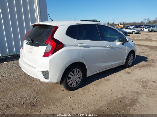 Photo 3 VIN: JHMGK5H54GX021875 - HONDA FIT 