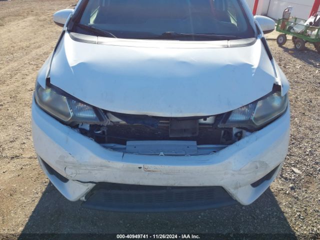 Photo 5 VIN: JHMGK5H54GX021875 - HONDA FIT 