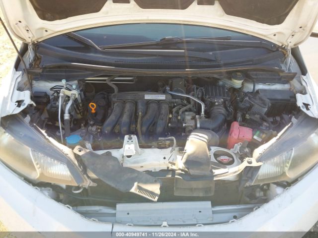 Photo 9 VIN: JHMGK5H54GX021875 - HONDA FIT 