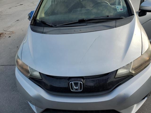 Photo 10 VIN: JHMGK5H54GX026686 - HONDA FIT LX 