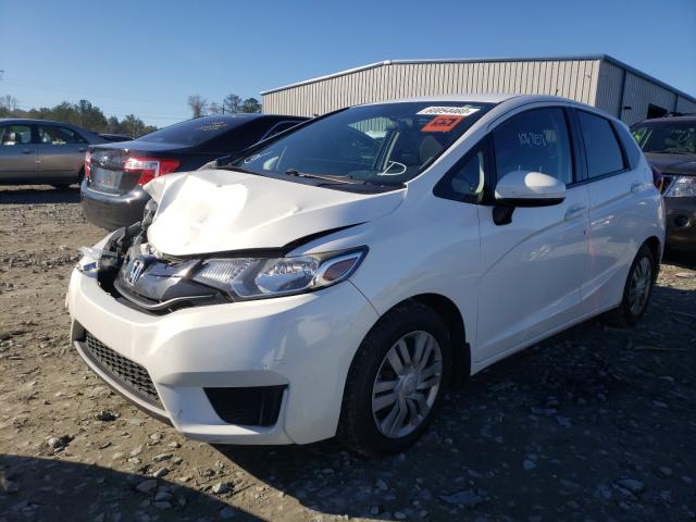 Photo 1 VIN: JHMGK5H54GX027286 - HONDA FIT LX 