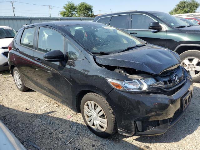 Photo 3 VIN: JHMGK5H54GX027949 - HONDA FIT LX 