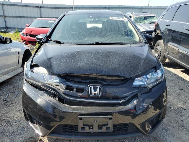 Photo 4 VIN: JHMGK5H54GX027949 - HONDA FIT LX 