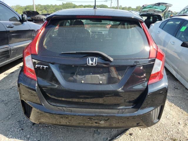 Photo 5 VIN: JHMGK5H54GX027949 - HONDA FIT LX 