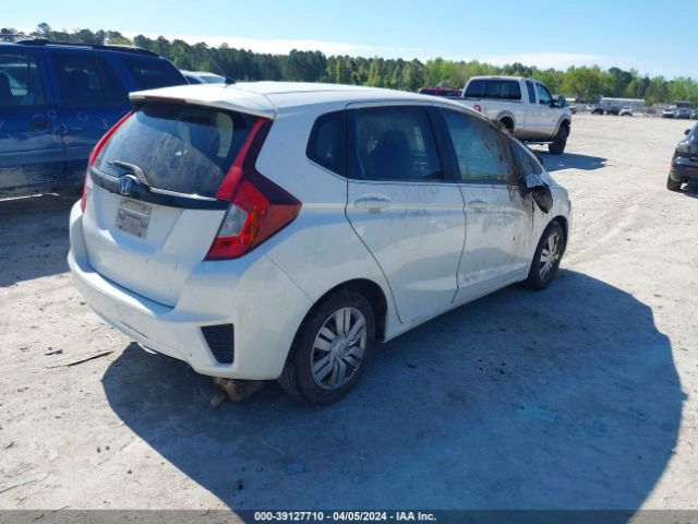 Photo 3 VIN: JHMGK5H54GX028616 - HONDA FIT 