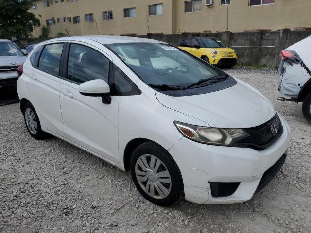 Photo 3 VIN: JHMGK5H54GX031256 - HONDA FIT LX 