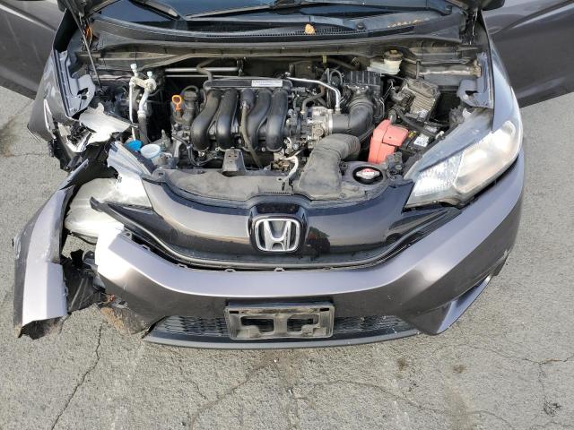 Photo 10 VIN: JHMGK5H54GX033718 - HONDA FIT LX 