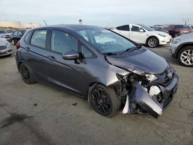 Photo 3 VIN: JHMGK5H54GX033718 - HONDA FIT LX 