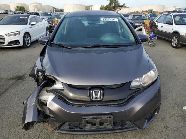 Photo 4 VIN: JHMGK5H54GX033718 - HONDA FIT LX 