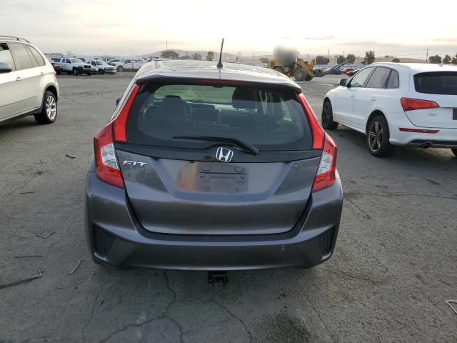 Photo 5 VIN: JHMGK5H54GX033718 - HONDA FIT LX 