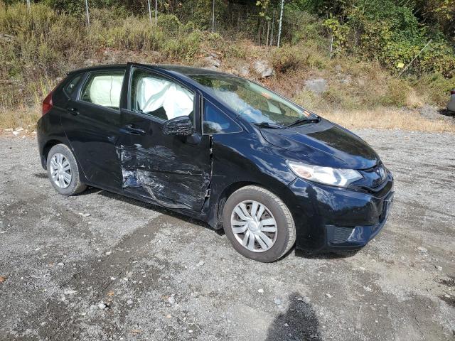 Photo 3 VIN: JHMGK5H54GX034982 - HONDA FIT LX 