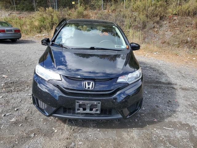 Photo 4 VIN: JHMGK5H54GX034982 - HONDA FIT LX 