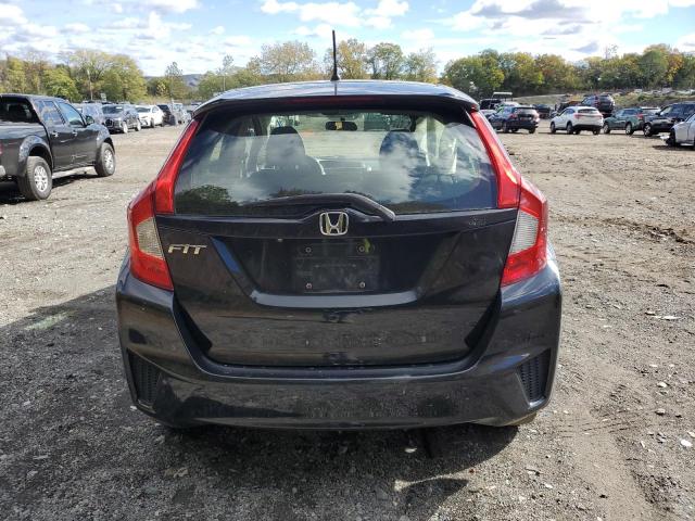 Photo 5 VIN: JHMGK5H54GX034982 - HONDA FIT LX 