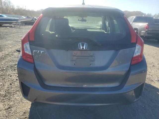 Photo 5 VIN: JHMGK5H54HS009479 - HONDA FIT LX 