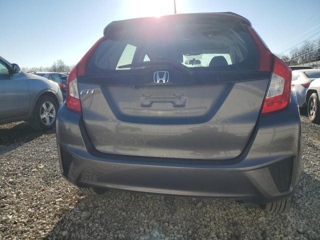 Photo 5 VIN: JHMGK5H55GS004855 - HONDA FIT LX 